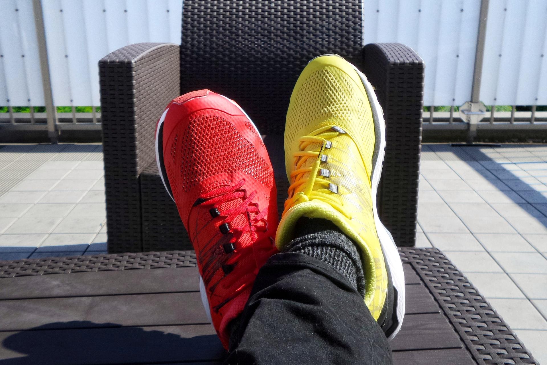 pair of red-and-yellow sneakers